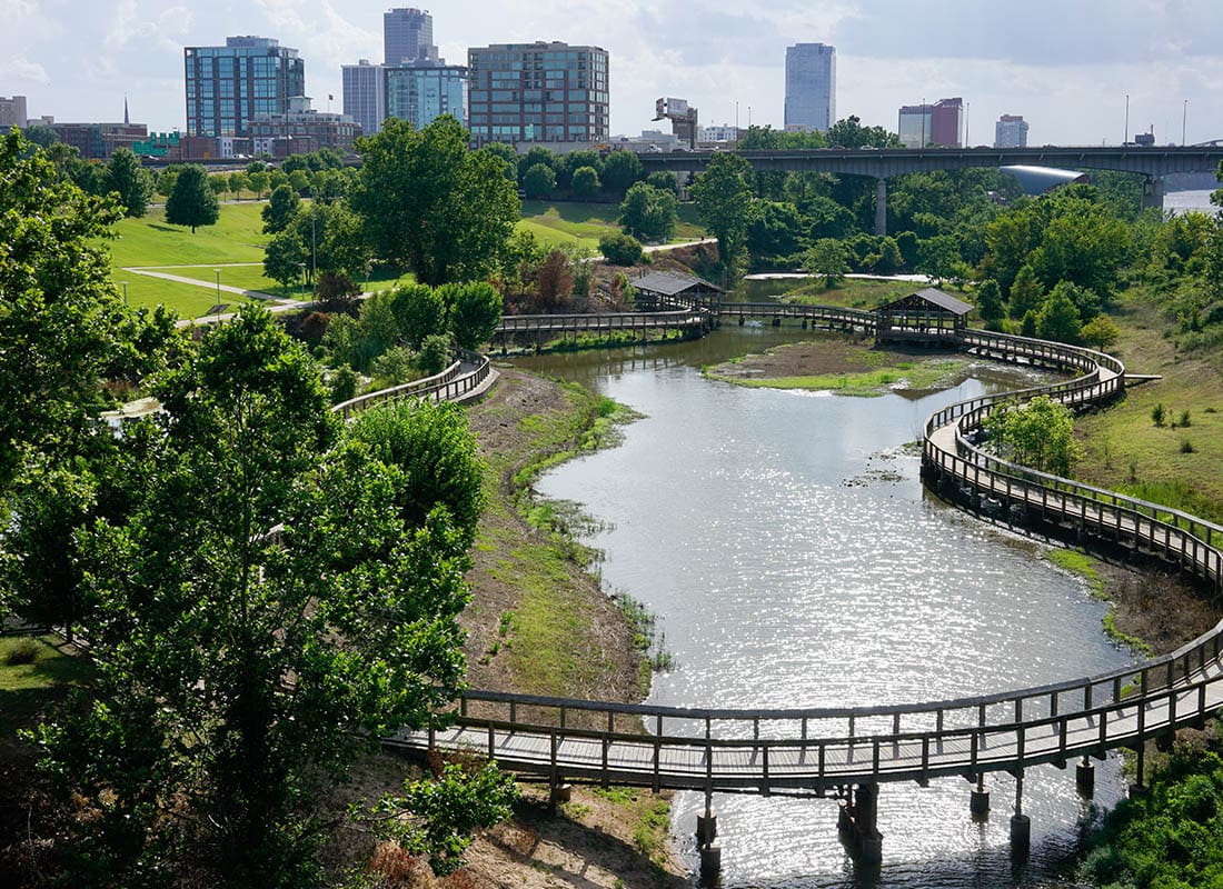 Little Rock, AR - Aerial view of Little Rock, AR city in the background of a park